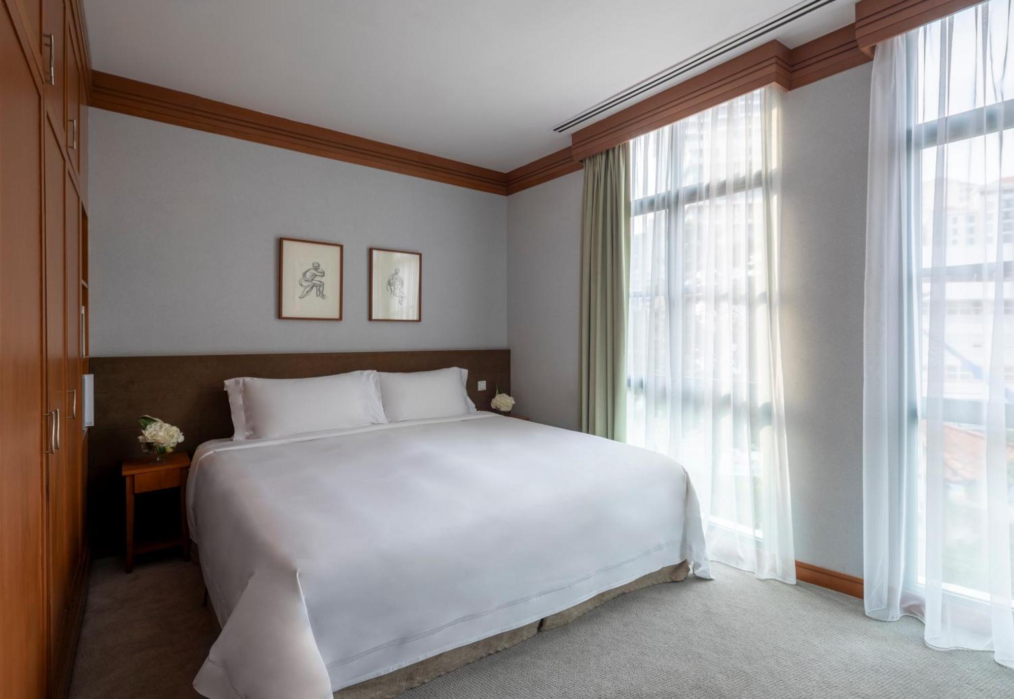 Fraser Place Robertson Walk Singapore Exteriör bild A bedroom at The Hari